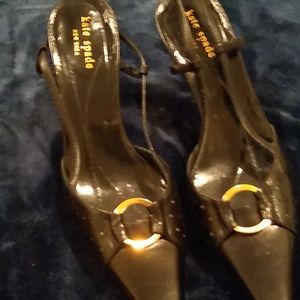 A pair of Kate Spade shoes